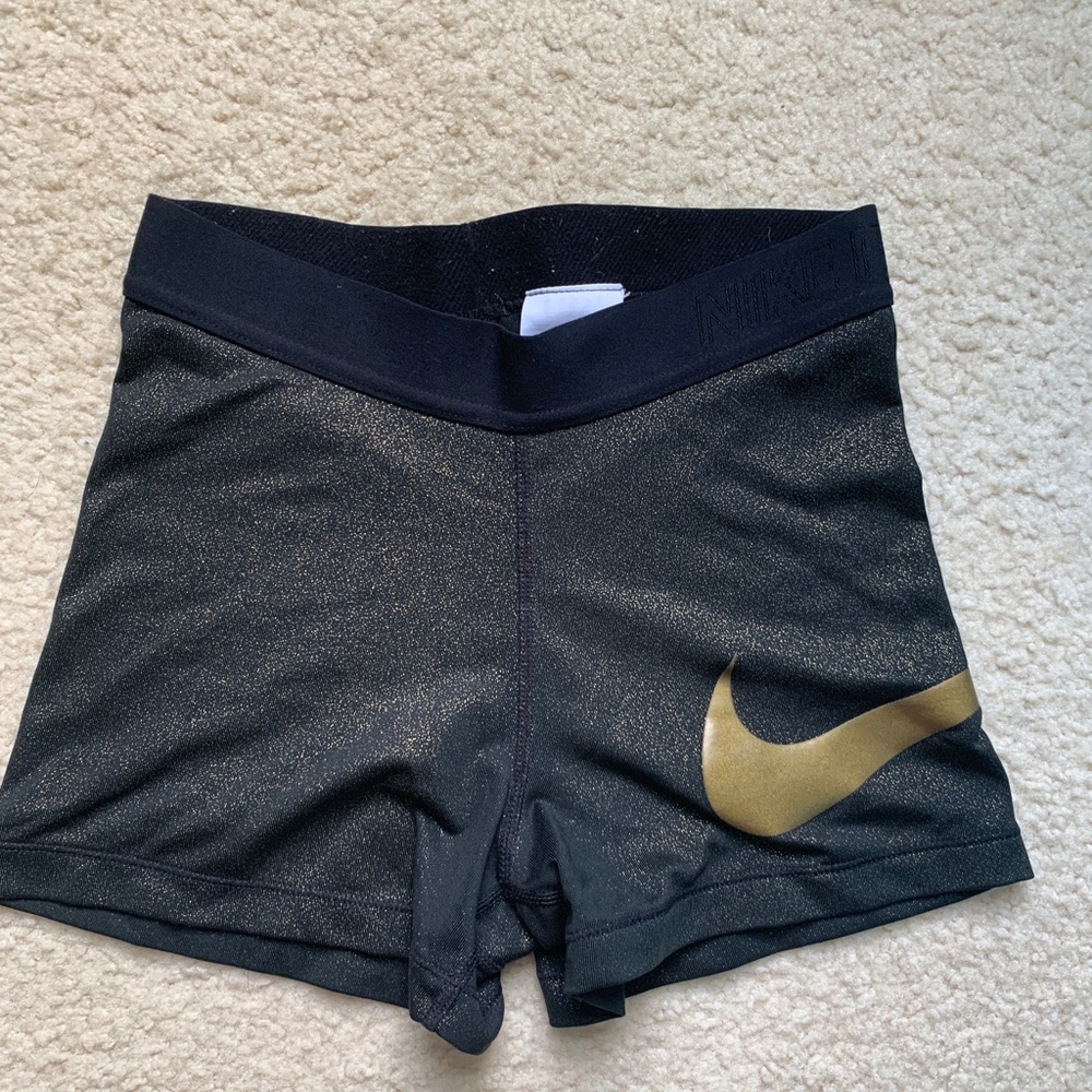 Gold and black Nike pro spandex